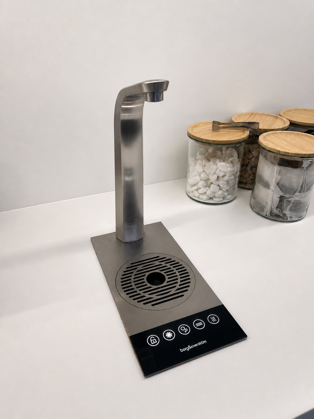 A Borg & Overström tap on a kitchen worktop alongside a Birchall tea station
